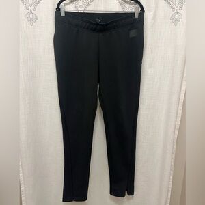 Adidas black on black track pants - tapered leg with/ hidden zippers.